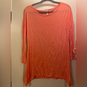 lighter orange longe sleeve top